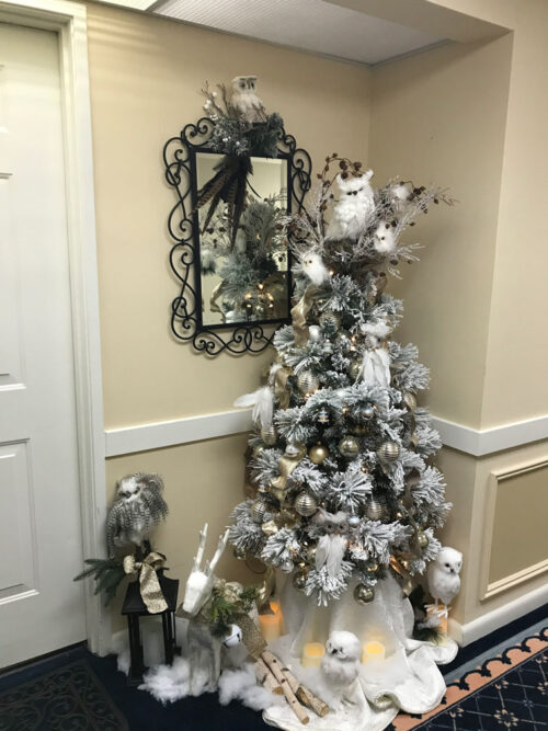 snowy owl on christmas tree
